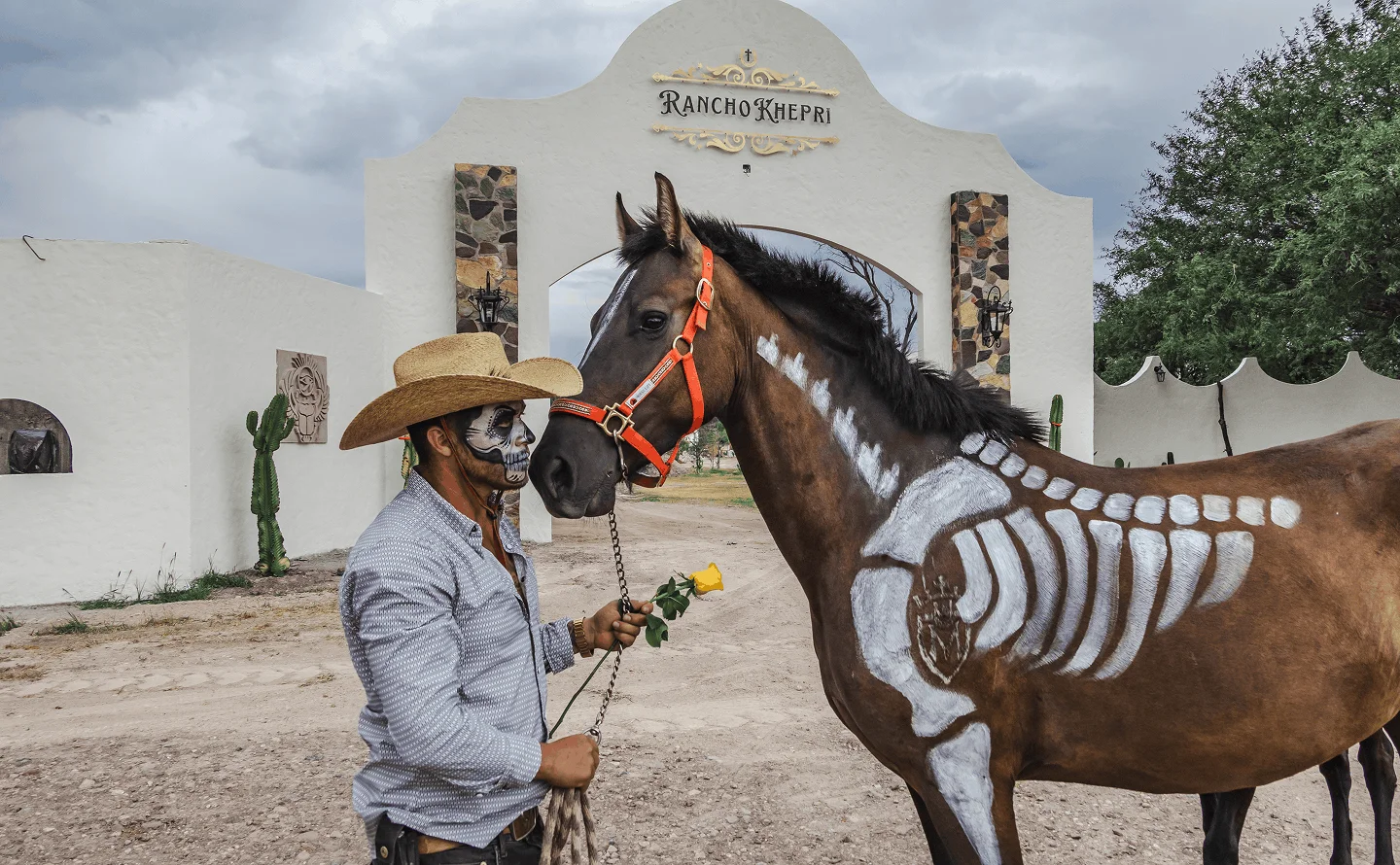 Cowboy with a horse painted as a Día de los Muertos skeleton at Rancho Khepri